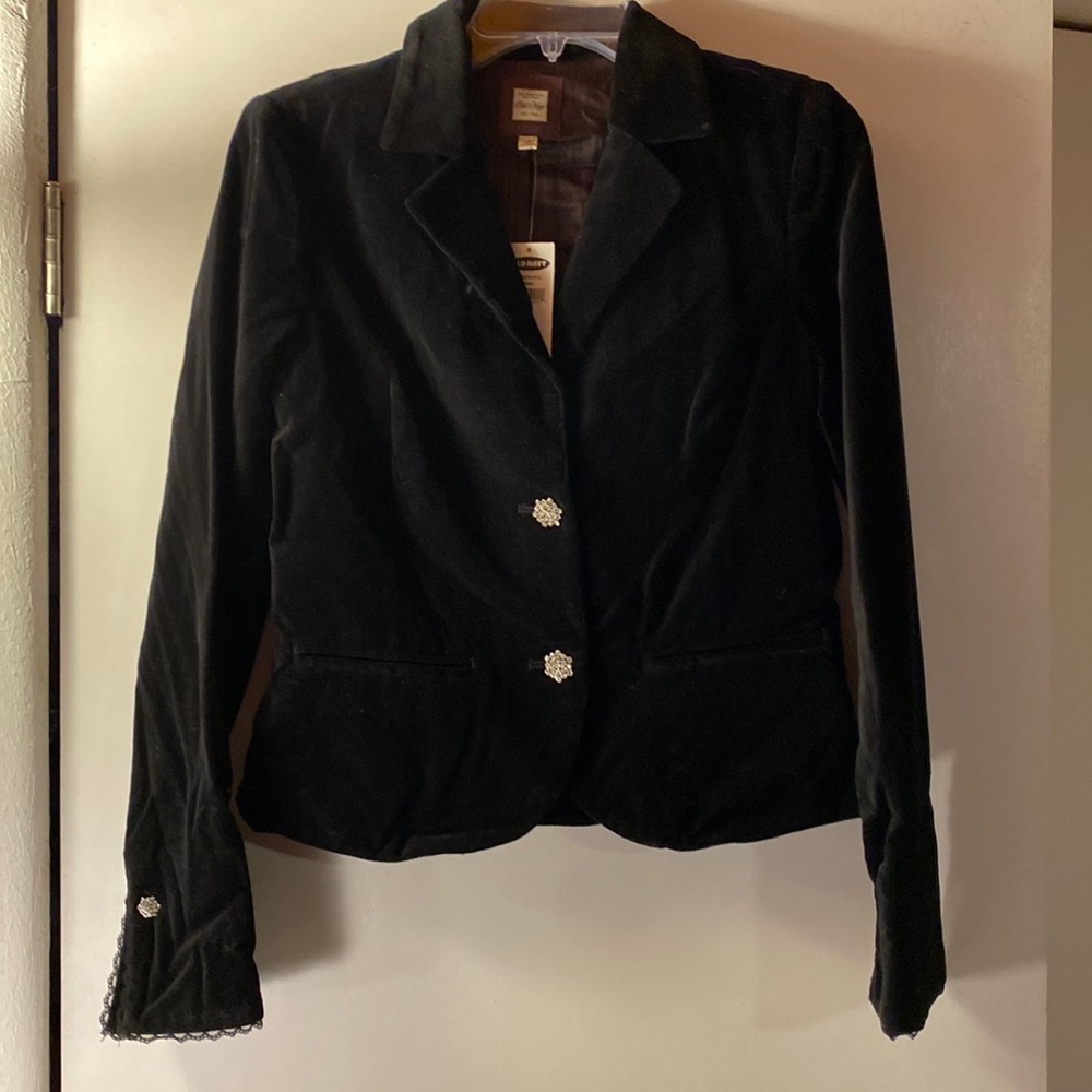 Vintage. Black velvet with crystal buttons. Great for a party or night out.